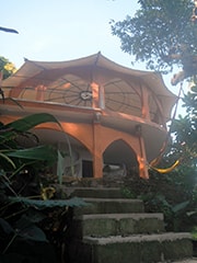 Casa Isabel pavilion in Yelapa at golden hour — the hillside retreat where Paul's craniosacral classes are held